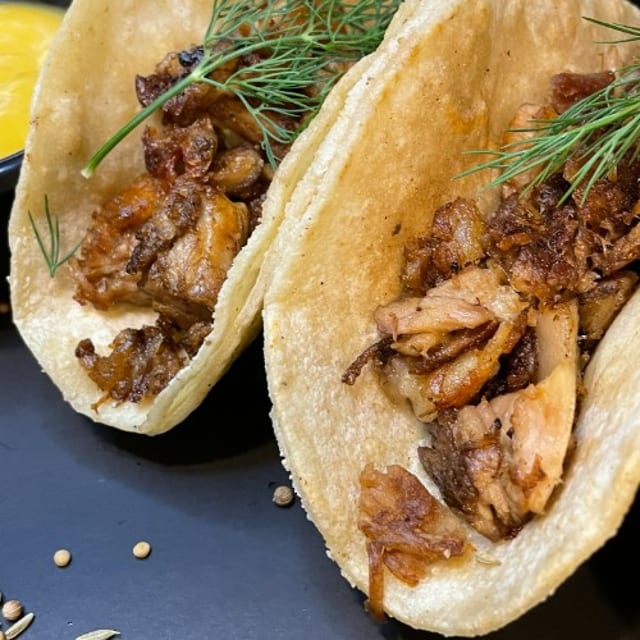 3 Pork Carnitas Tacos.